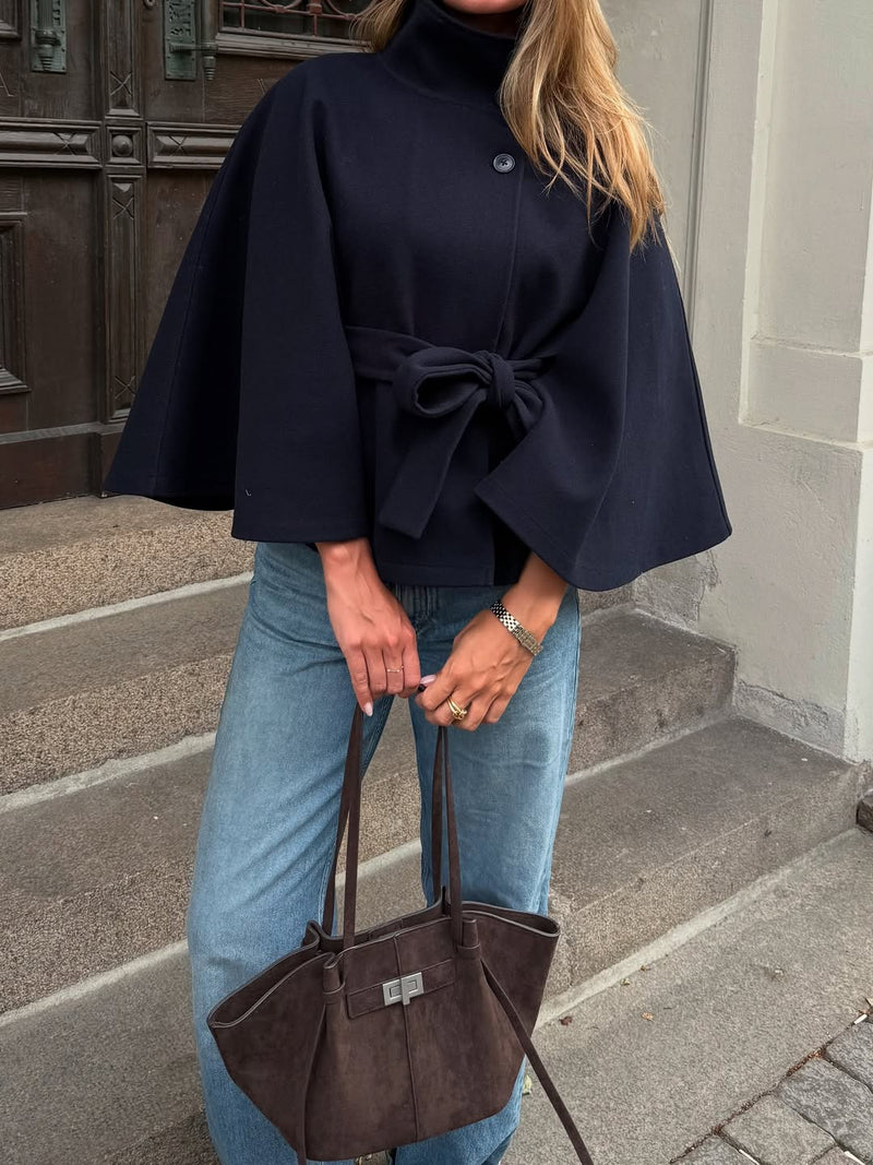 SOKYND navy belted cape jacket worn outdoors